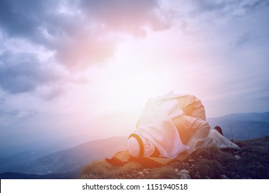 The IIslamic Man Praying   On The Mountain.