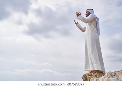 The IIslamic Man Praying   On The Mountain.