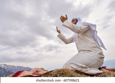 The IIslamic Man Praying   On The Mountain.