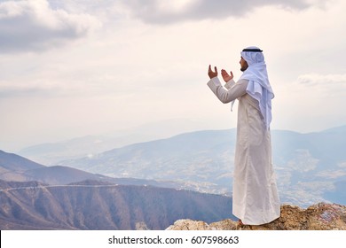 The IIslamic Man Praying   On The Mountain.