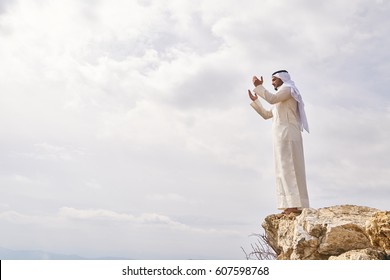 The IIslamic Man Praying   On The Mountain.