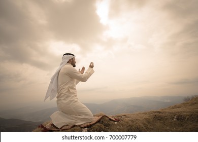 The IIslamic Man Praying   On The Mountain.