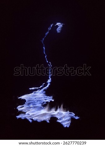 Ijen blue flame. Fire that come from the sulphur crater. Glowing in the dark.