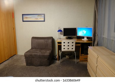 IKEA Furniture, A Computer With A Windows Screensaver And A Picture On The Wall In The Living Room - Moscow, Russia, 12 10 2019