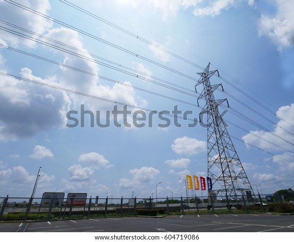 IKEA\'s car park overlooks the blue sky,\
high voltage pole March 18, 2016 Bangna,\
Thailand
