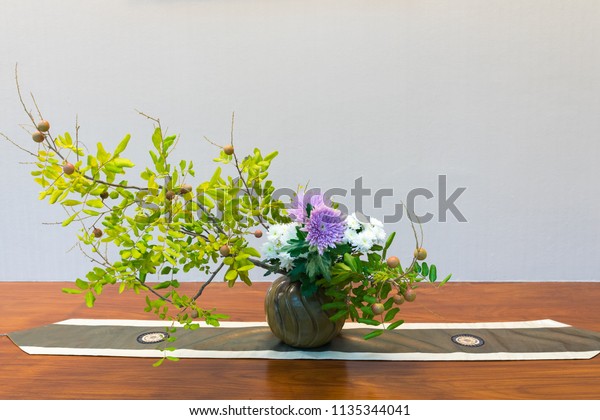 Ikebana Colorful Flower Vase On Wooden Royalty Free Stock Image