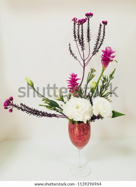 Ikebanajapanese Style Flower Arrangement Wine Glasspink Stock