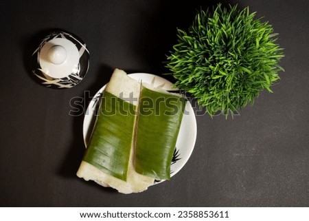 Ila Ada,Rice Dumplings covered in banana leaves Traditional Kerala Breakfast, Selective focus full Depth Of Field,South Indian breakfast known as Ela Ada filled with sugar and coconut and other spices