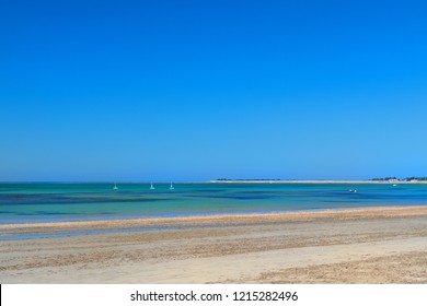 Ile De Rée- Beach Landscape Sand And Sea With Sailboats At The Horizon