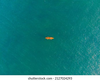 Ilhabela - São Paulo - Brazil - Oct 12th 2019: Orange Kayak Drone View