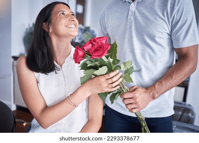 Ill do everything to keep the smile on her face. an unrecognizable man surprising his girlfriend with flowers at home.
