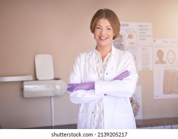 Ill Improve Your Smile Appearance With Pleasure. Portrait Of A Female Dentist Standing In Her Office With Her Arms Crossed.