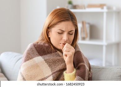 Ill Woman Coughing At Home