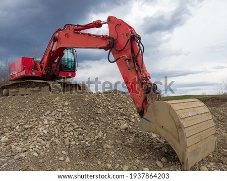 Illegal exploating of grader with excavator on river bank Stock photo © 