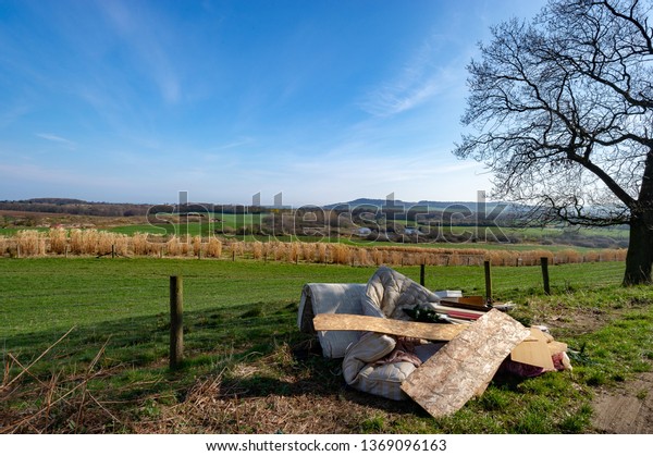 Illegal Fly Tipping in\
the English Countryside causing Social Issues to the Land Owners\
and Local Councils.