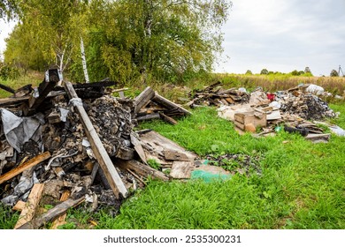 Illegal garbage dump in the field

