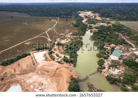 Illegal gold mining deforestation of the Amazon Rainforest, aerial view in the Jamari National Forest in Rondonia, Brazil. Concept of environment, ecology, climate change, global warming, nature.
