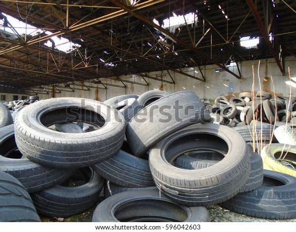 Illegal tire dump in\
an abandoned building