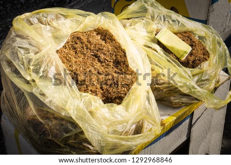 The illegal trade of contraband tobacco on the street market in Konjic, Bosnia and Herzegovina