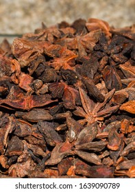 Illicium Verum Is A Medium-sized Evergreen Tree Native To Northeast Vietnam And Southwest China. A Spice Commonly Called Star Anise, Staranise, Star Anise Seed, Chinese Star Anise, Or Badian 