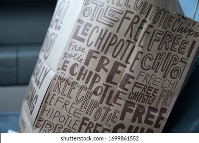 Illinois, United States, - April 2020: A Local Chipotle Is Open For Mobile Order Pickups. Accommodating Customers With Mobile Orders And Partneting With Delivery Services Like Uber Eats And Door Dash.