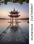 illuminated ancient Jixian Pavilion at West Lake, Hangzhou, China. All Chinese words only introduce itself which means Jixian Pavilion without advertisement.