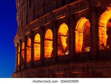 Illuminated Arches Of Colosseum . Ancient Architecture In Rome Italy 