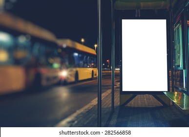 Illuminated Blank Billboard With Copy Space For Your Text Message Or Content, Advertising Mock Up Banner Of Bus Station, Public Information Board In Night City, Auto Bus Stop Empty Poster