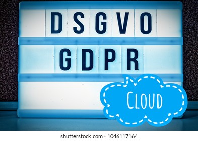 Illuminated board with the inscription DSGVO and GDPR (Datenschutzgrundverordnung) blue in English GDPR (General Data Protection Regulation) and the inscription Cloud Wolke in English: Cloud 