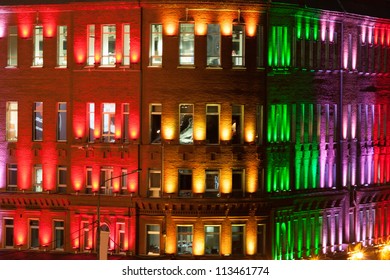 Illuminated building in different colors in the night, Moscow, Russia