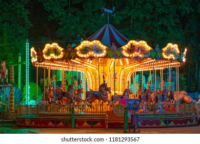 Illuminated Carousel At Night