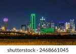 Illuminated colorful downtown Dallas Texas city skyline buildings. Photo taken in the evening at dusk