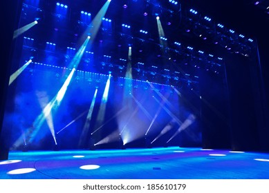 Illuminated Empty Concert Stage With Smoke