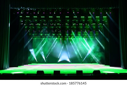 Illuminated Empty Concert Stage With Smoke