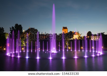 The illuminated fountain at night 