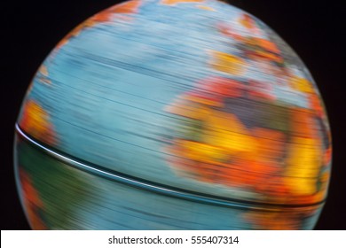 Illuminated globe from inside spinning, colourful earth globe