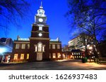 Illuminated Independence Square and Hall at night during winter in Philadelphia building where the United States Constitution was signed