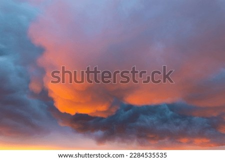Illuminated mammatu's clouds at sunset, stormy clouds