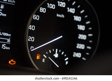 Illuminated modern car speedometer. Vehicle with empty fuel tank - Powered by Shutterstock