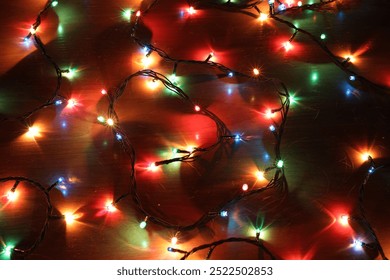  Illuminated multi colored Christmas lights background. Christmas decoration. Electric garland. Copy space. - Powered by Shutterstock