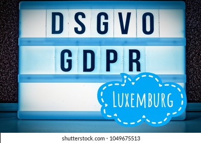 Illuminated plate with the inscription DSGVO and GDPR (Datenschutzgrundverordnung) blue in English GDPR (general data protection regulation) and the inscription Luxemburg in English: Luxembourg