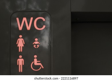         
Illuminated Public Restroom Signage In The City                       