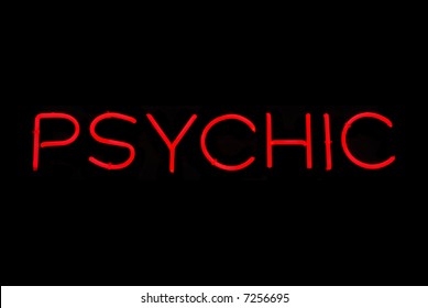 Illuminated Red Psychic Neon Sign On Black