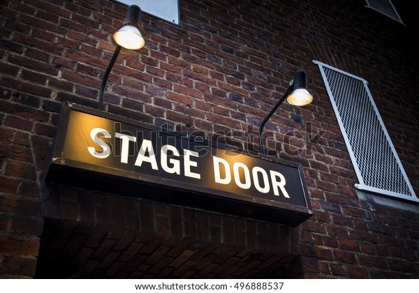Illuminated sign at\
theatre in London\'s West\
End