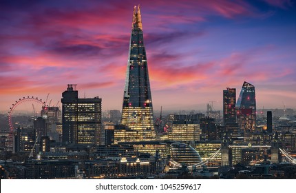 The Illuminated Skyline Of London, United Kingdom, During An Intense Sunset