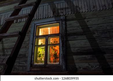 Illuminated Window Of A Russian Dacha At Night. 