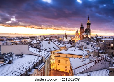 Illuminated winter city skyline on evening, Cracow, Poland, Europe