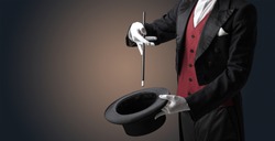 Illusionist White Hand Wants To Conjure With Magic Wand From A Black Cylinder Something