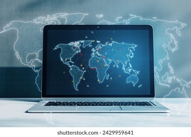 Illustrating global connectivity, this laptop features a world map with connecting lines for networking