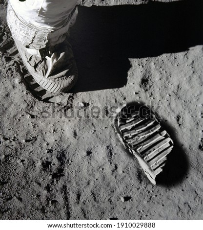 An illustration of Astronaut's boot print on moon (lunar) surface. Elements of this image furnished by NASA.